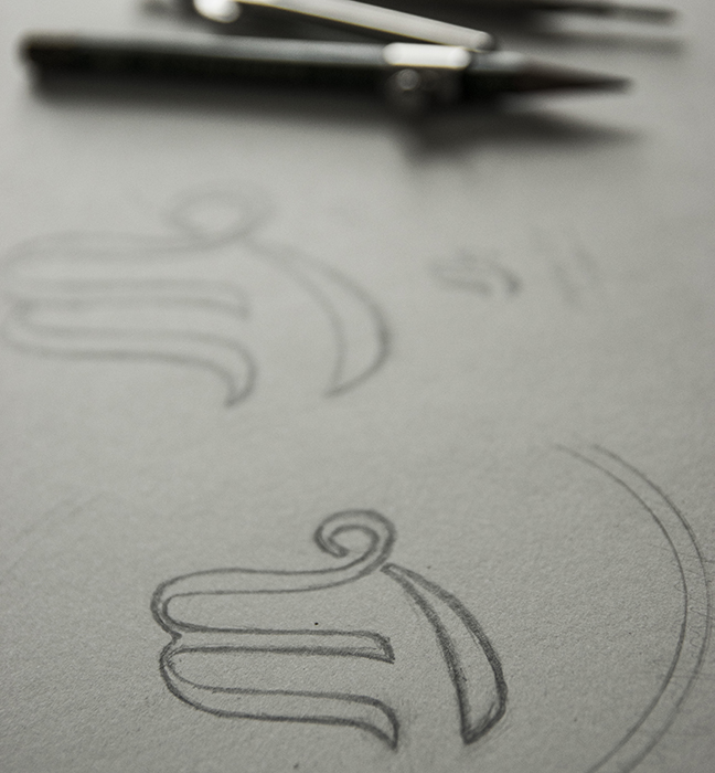 Logo sketch inspired by vintage logos & instrument curves